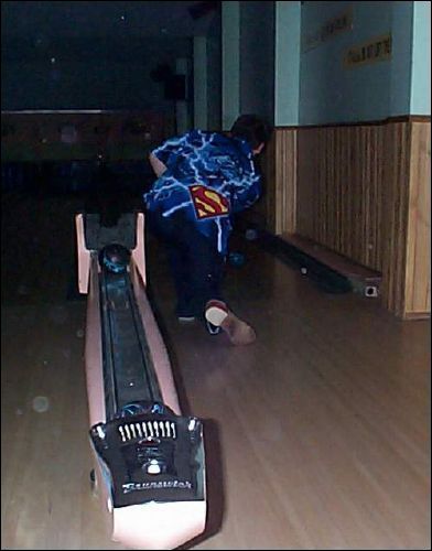 Here's Chris bowling... Hmmmmmm... gotta love that angle! Ha ha!