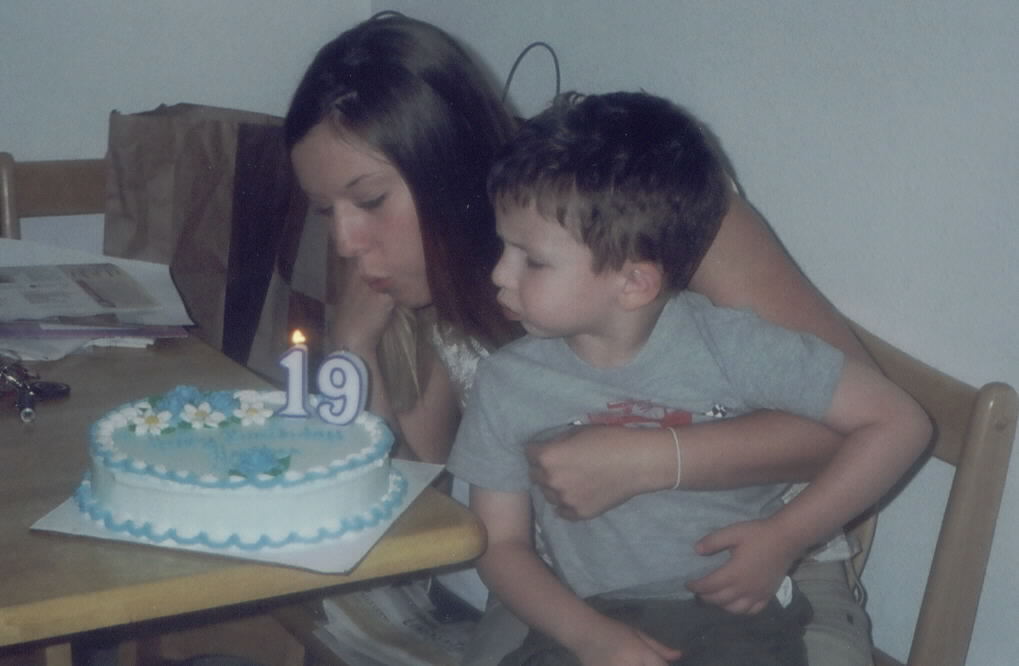My nephew and I blowing out the candles