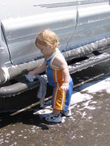 Benjamin washing his momma's truck