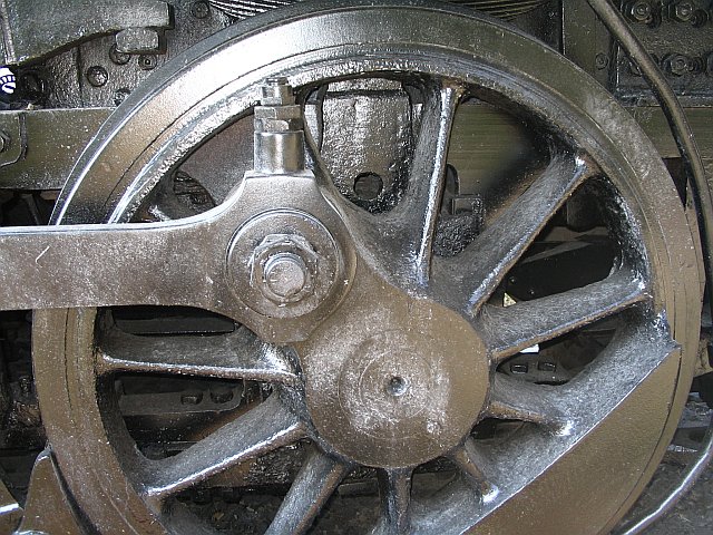 [Closeup photo of drive wheel - Dinky the steam engine in Conyers, Georgia - Fall, 2005]