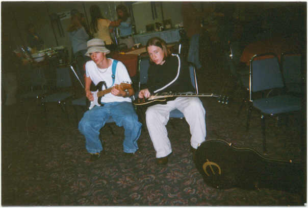 Guitarist Kyle Burnam and roadie Chris Andrews chilling before we play