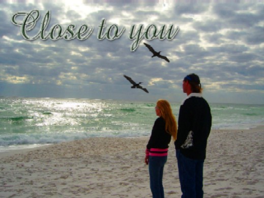 Couple looking over the ocean � Photo by Sarah E. Crawford 