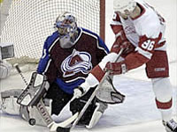 Holmstrom sneaks one past Roy