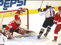 Drury beats Hasek