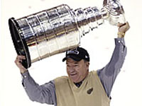 Scotty Bowman lifts his 9th Cup