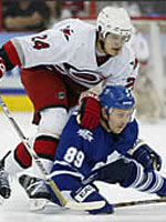 Kapanen pulls down Alexander Mogilny