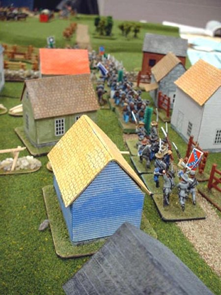 The Rebs rush reinforcements from Sharpsburg to stop the advance of the Federal troops.
