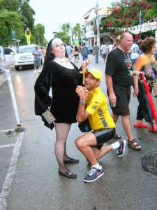 Armstrong praying with a pregnant nun