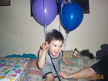 Johnny with his first set of helium ballons.