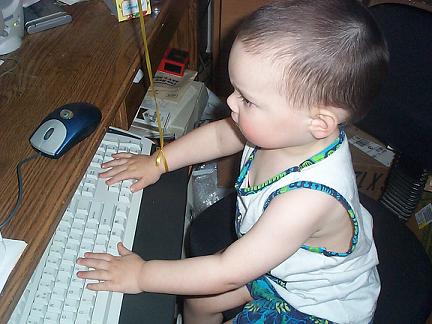 Johnny's learning the family computer business early.