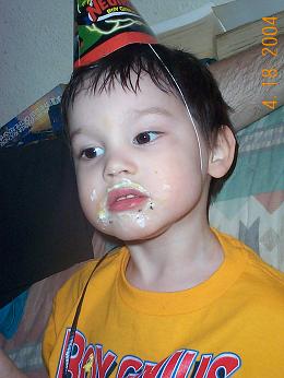 Johnny with a mess of cake.