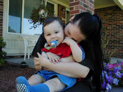 Jonathan outside with his Mommy.