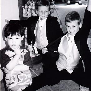 Johnny with his cousins at his aunt's wedding.