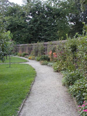 a curved wall surrounding the upper garden