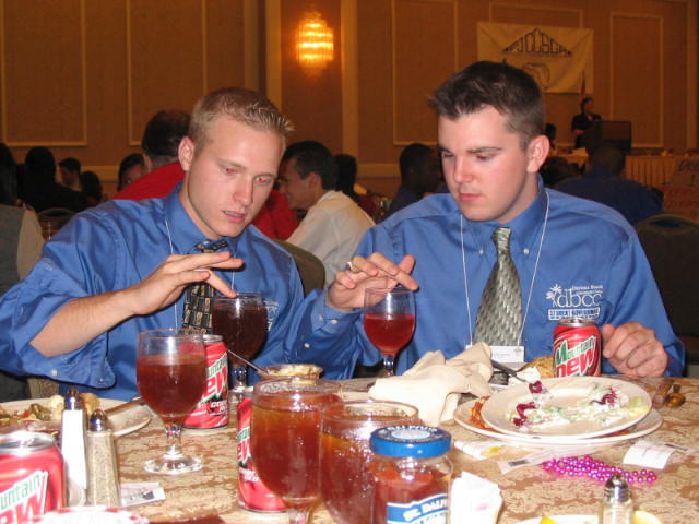 Mike and Kyle playing the dinner glasses