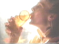 Woman gulping over her ice tea made from the Ice Tea Pot from Mr. Coffee
