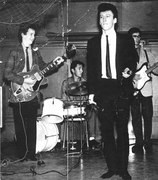 Eric Clapton performing with The Roosters