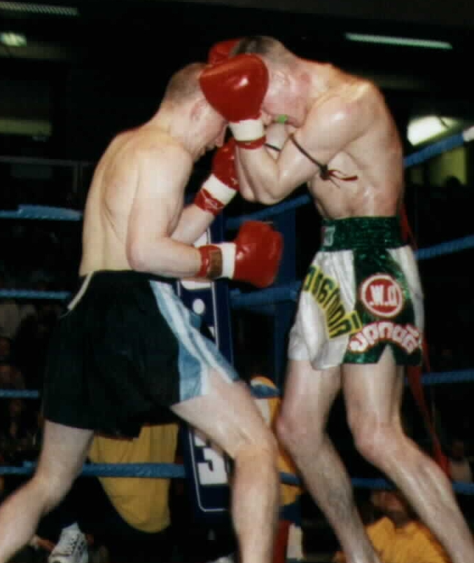  Lee covering up as Wesley attacks