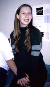 BTW: That's her boy-toy's hand she's holdin! =)