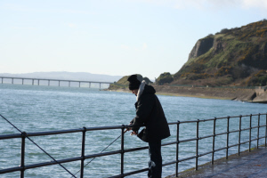 Fishing off the promenade at Whitehead