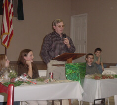 Agent congratulates club members.