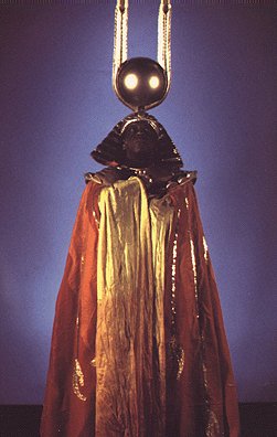Sun Ra in Space is the Place: I'll have permanent spinal damage if I wear this for more than five minutes.