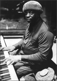 Sun Ra circa 1977: How d'ya play this thing again?