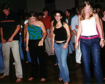 Kirk, Lydia, Kate, and Melissa learn a new dance