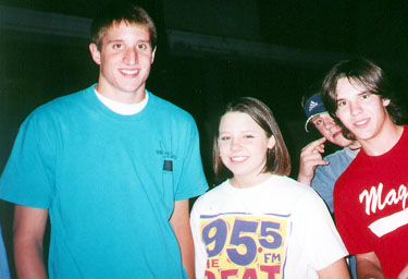 Kirk, Gina, and....hmmm...wait, what does Strehlow have on his finger?