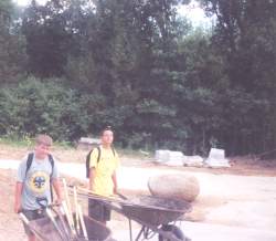 Scouts performing service hours at camp