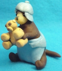 collectible baby ferr-itsie with cap and teddy