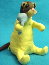 collectible baby ferr-itsie with jumpsuit and rattle