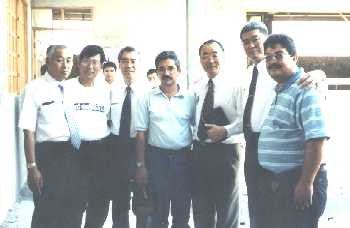 Claudio Acevedo junto al Dr. Terry Yac pastor coreano y diaconos y pastor Danny Pastran