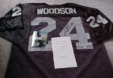 Charles Woodson Autographed Jersey
