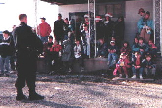K-9 Officer Rick Howell with some of the kids and their parents