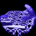 Woman Sewing a Quilt