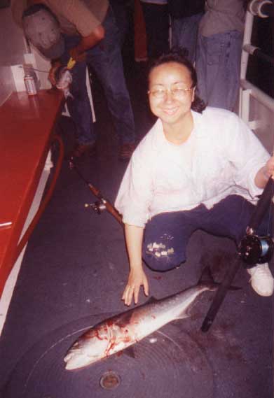 On the deck of the Miss Barnegat Light Yen Fu with her first Blue Fish
