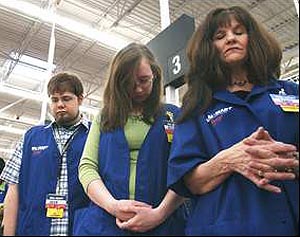 Wal-Mart employees praying for health benefits