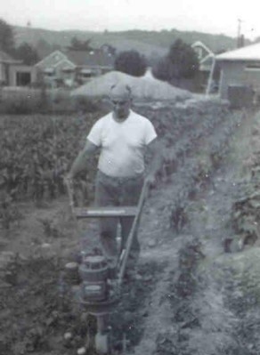 Our first plow--A David Bradley with 3HP.  After getting it fixed once, the fixers didn't put oil in it and the thing went PING halfway across the garden.