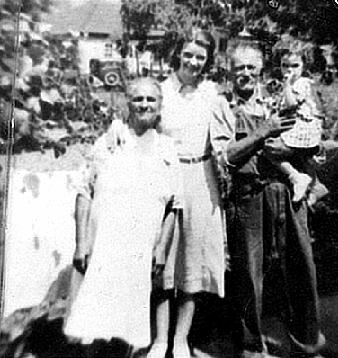 Great-Grandfather with Katherine, Little Katherine, and Great-Grandmother.  Grandmother would eat Great-Grandfather's prize grapes and leave the peelings on the ground.  Accordingly, she was always caught.