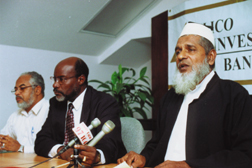 Muslims do not collect interest but they can trade and invest, says Waffie Mohammed (r). Also in photo is Sariah member, Dr A Mohammed and CIB President, Lennox Archer.