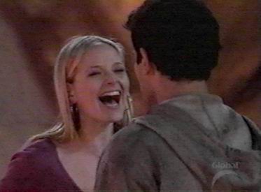 charitylaughingmiguel.JPG - 13856 Bytes