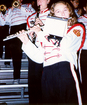 Genelle playing her flute