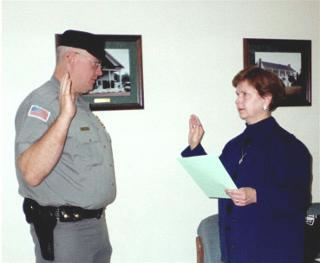 Bruce Speight swearing in.