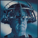 Man wearing an electronic thinking-cap.