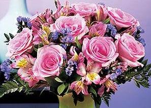 flowers and colors = colorful flowers -- hendiadys: a Latinized form of a Greek phrase  meaning one through two; the use of a pair of nouns joined by and where one has the effect of a modifier.
 