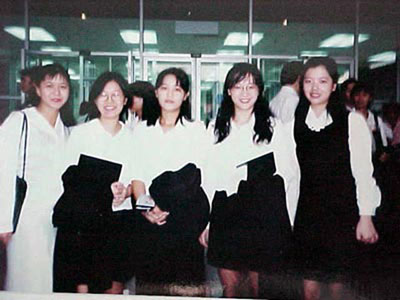Taking photo before putting on the bulky gown,,,,, in front of the new library.....