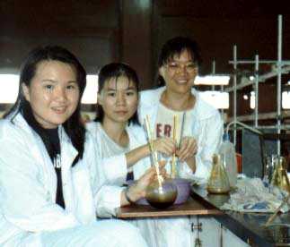 Heeheeehhhheeee...look at our cheeky smile....Wondering what is the brown brown liquid being mixed....Think...