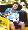 Chris Jr. Riding a bike rickshaw. (click here to see a larger picture)