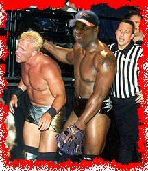 That's really a picture of Julio fighting Jarrett. Really. It's not just Booker T with Julio's head pasted on. I swear.